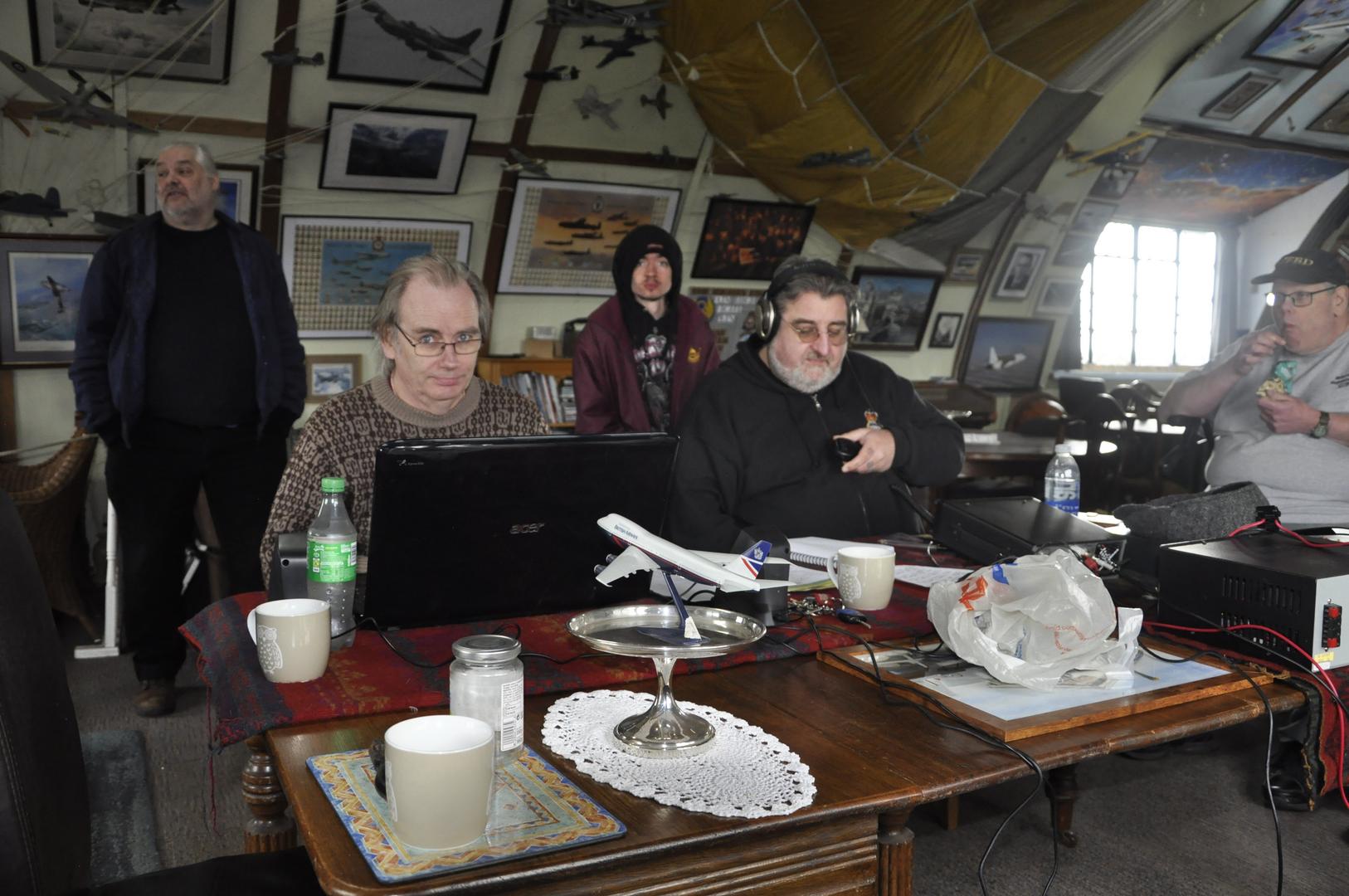 Greg 2W1BUF operating GB0WZL with Andy G7KNA logging. To the rear is (left to right) Kevin 2E0AWX, Ken M7MYU and Matt G7FBD