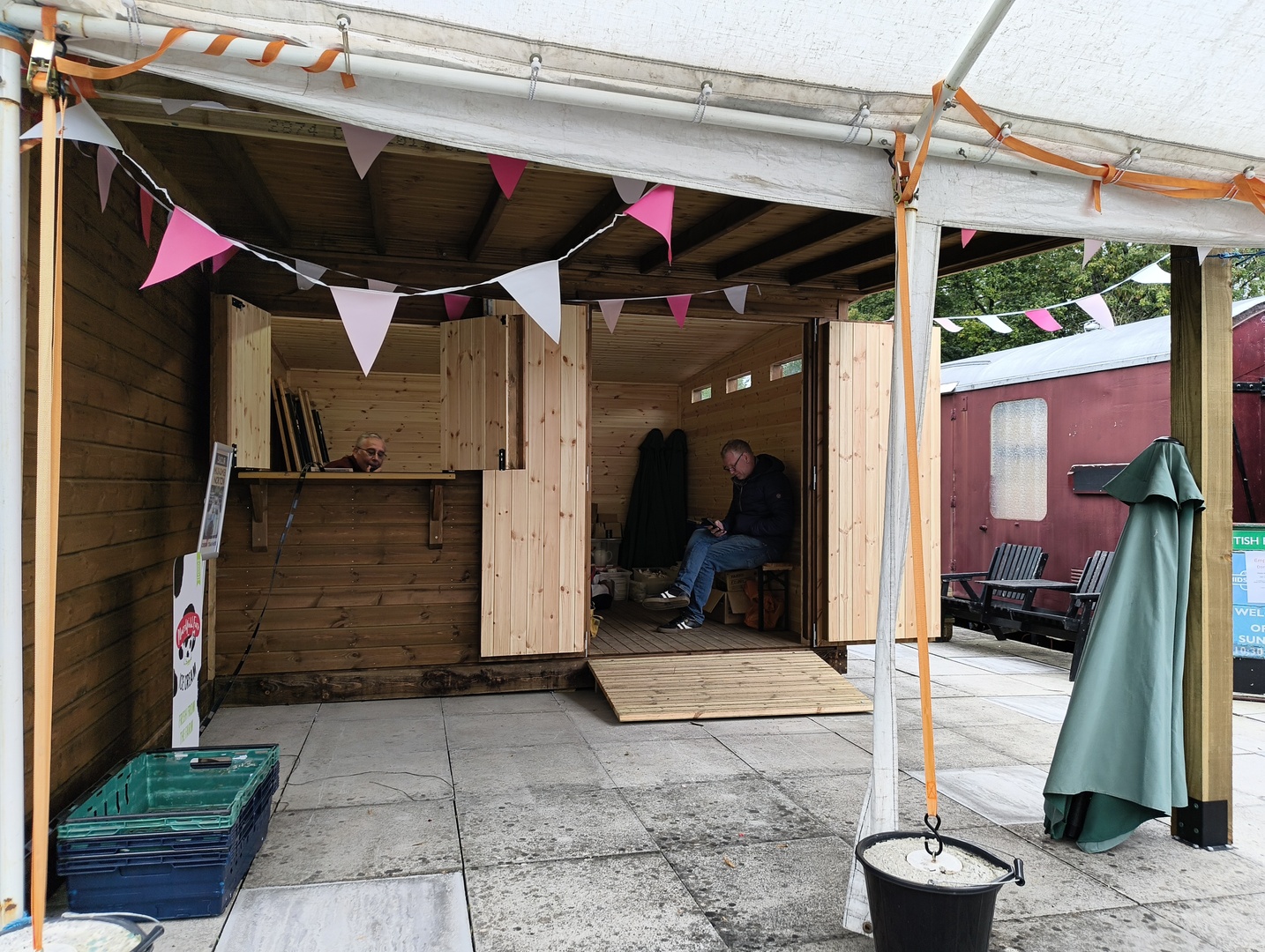 The operating post with David M7GVY visible through the window and Mark M0SKV in the doorway The operating post with David M7GVY visible through the window and Mark M0SKV in the doorway
