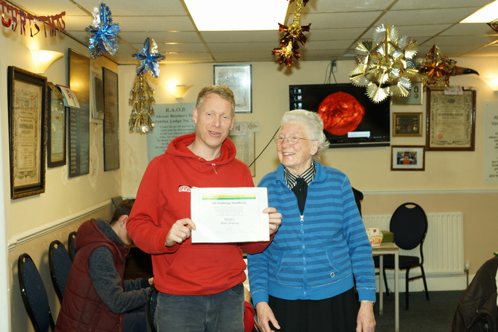 Mark M0SKV receiving the DX Challenge Certificate from Pearl Dunsford