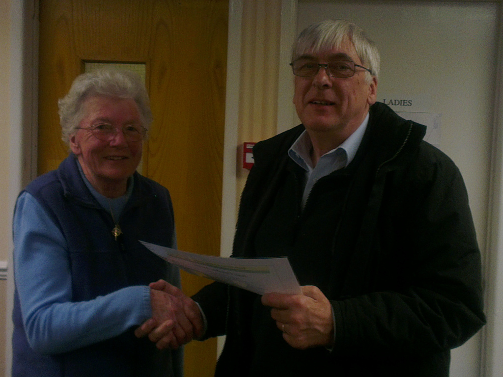 David G7BYN receiving the Jean Fletcher Award from Pearl Dunsford