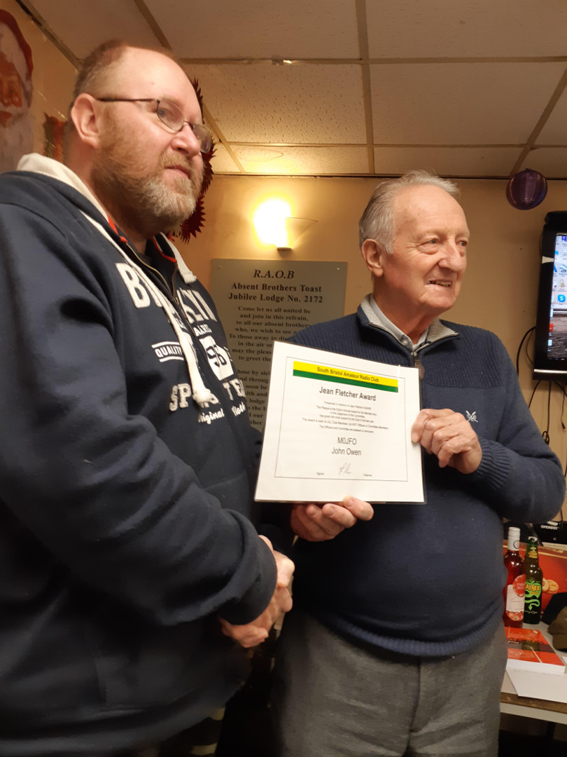 John M0JFO receives the Jean Fletcher Award from Club President Cyril G3XED